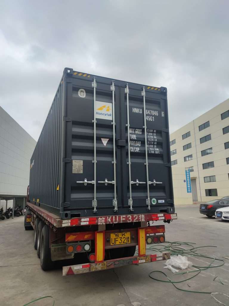 RUNYI factory loading area with forklift and export container